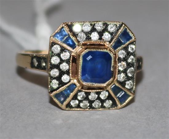 A 9ct gold, sapphire and diamond cluster tablet ring, size N.